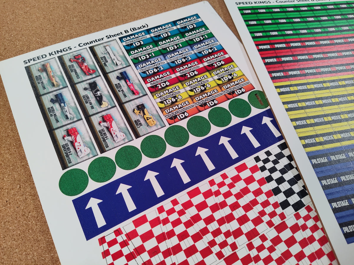 Collection of colorful counter sheets with various designs on a textured surface