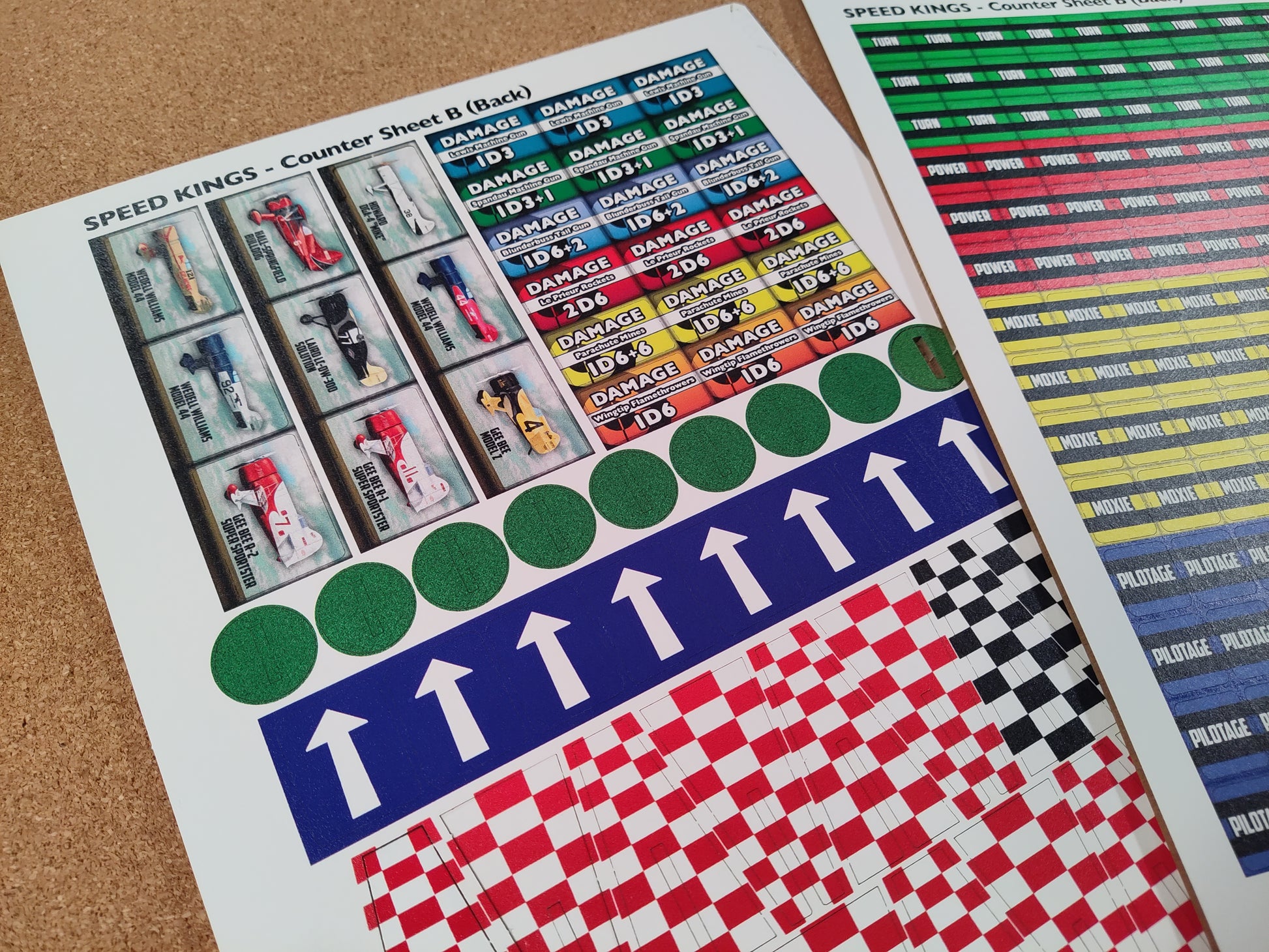 Collection of colorful counter sheets with various designs on a textured surface